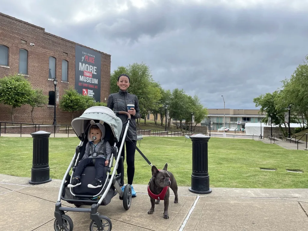 Marie pushing Zoe in a stroller outside the National Civil Rights Museum area in Memphis